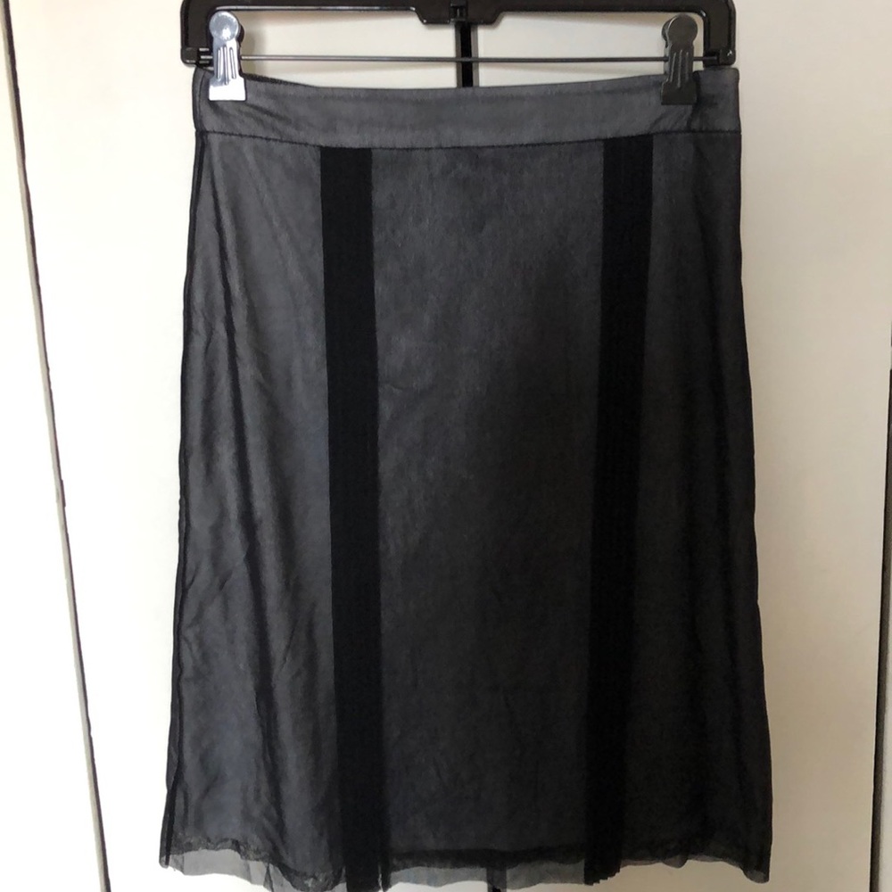 Black mesh side zip skirt with white slip